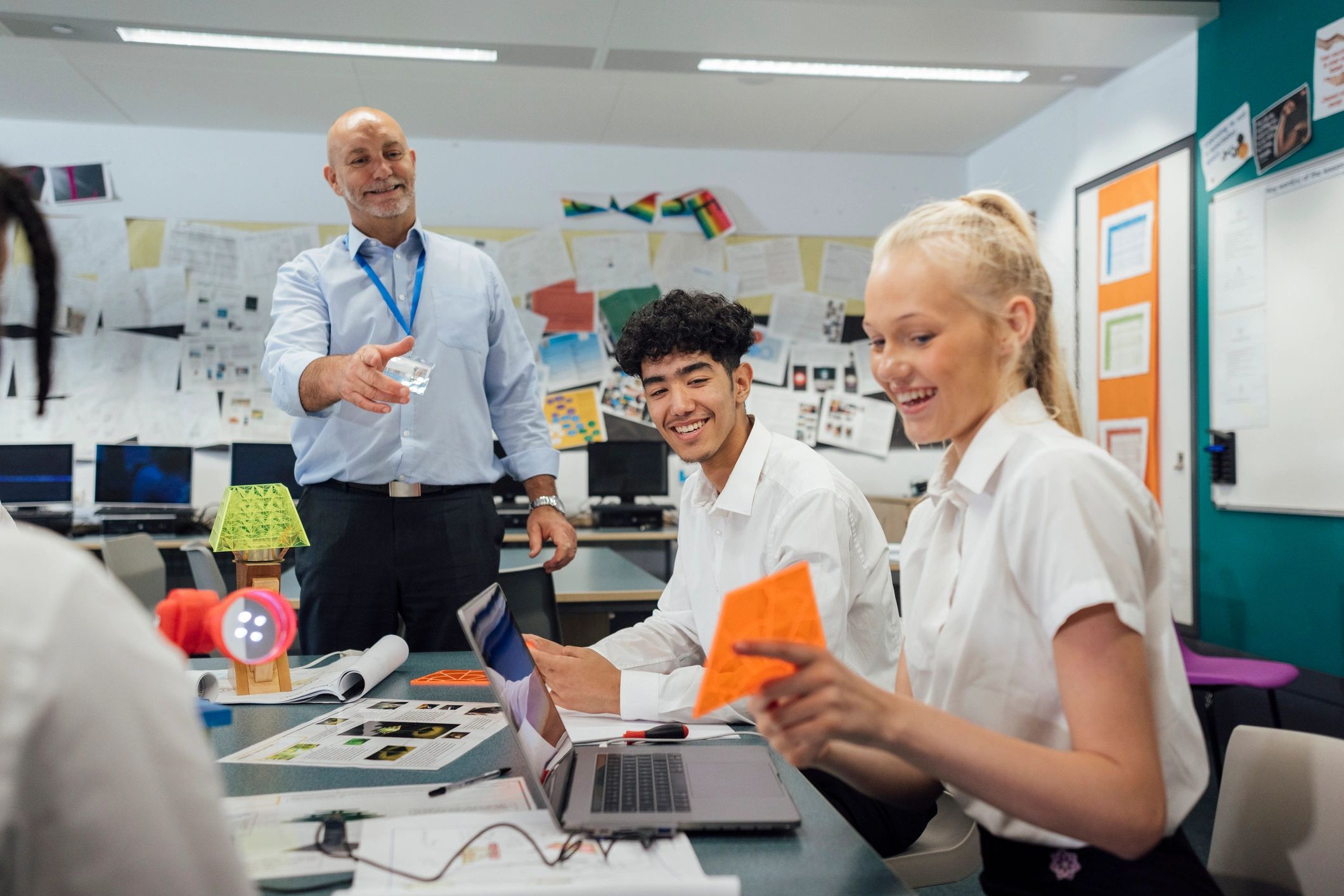 teacher with educational materials